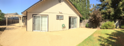 The outdoor concrete is resurfaced with impact resistant granulated rubber.